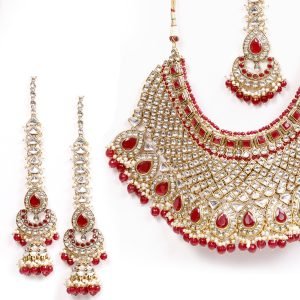 Gold plated Kundan choker in Red color with matching Tika