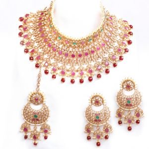 Gold plated polki choker set in Red-Green color combination hanging beads & matching tika